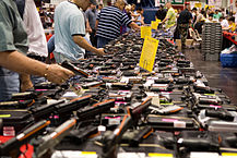 "Houston Gun Show at the George R. Brown Convention Center" by http://flickr.com/photos/glasgows/ - http://flickr.com/photos/glasgows/432945997/. Licensed under CC BY 2.0 via Commons - https://commons.wikimedia.org/wiki/File:Houston_Gun_Show_at_the_George_R._Brown_Convention_Center.jpg#/media/File:Houston_Gun_Show_at_the_George_R._Brown_Convention_Center.jpg