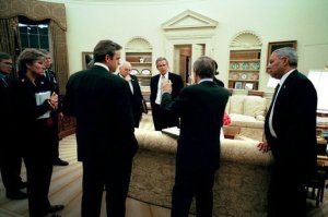 On Wednesday evening, March 19, 2003, President George W. Bush meets with his national security and communications advisors after authorizing military operations. Present, from left, are Steve Hadley, Deputy National Security Advisor; Karen Hughes, special advisor to the President; Chairman of the Joint Chiefs of Staff Richard B. Myers; Dan Bartlett, Communications Director; Vice President Dick Cheney, Secretary of Defense Donald Rumsfeld; National Security Advisor Condoleezza Rice; and Secretary of State Colin Powell. WHITE HOUSE PHOTO BY ERIC DRAPER